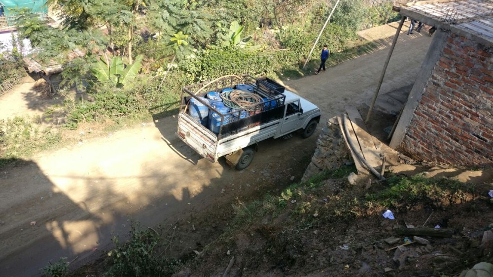 A pick-up truck with barrels of water to be sold in Kiphire Town. The town has been facing an acute shortage of water supply over the past year.