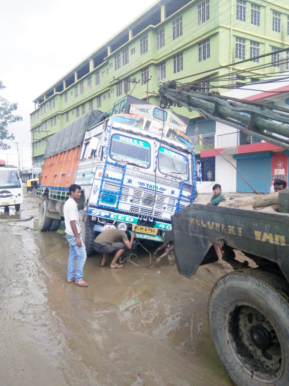 A cargo laden truck, which got stuck in a water-logged pothole at Purana Bazaar, Dimapur on September 20.