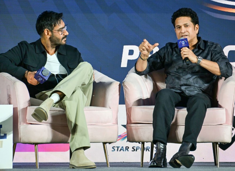 Mumbai: Former cricketer Sachin Tendulkar speaks at the press conference for the Indian Street Premier League (ISPL) ahead of Season 3, as actor Ajay Devgn looks on, in Mumbai on Sunday, September 28, 2025. (Photo: IANS)