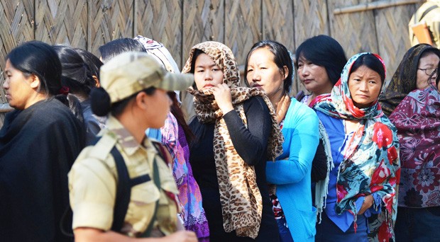 Naga women line up to cast their vote in a polling booth.