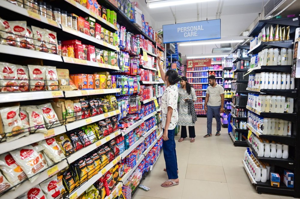Prayagraj: Customers shop at a grocery store after the recent GST rate reductions in Prayagraj on Monday, September 22, 2025. (Photo: IANS)