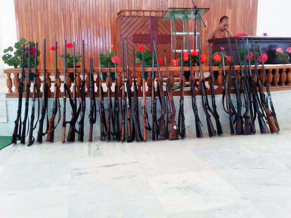 Assorted ‘hunting guns’ submitted by the villagers are put on display at the platform of Kivikhu Baptist Church during the Sunday devotional service on October 8. To be kept in the safe custody Church, the guns were submitted to show their commitment for protecting and preserving biodiversity. (Photo Courtesy: Ivan Zhimomi)