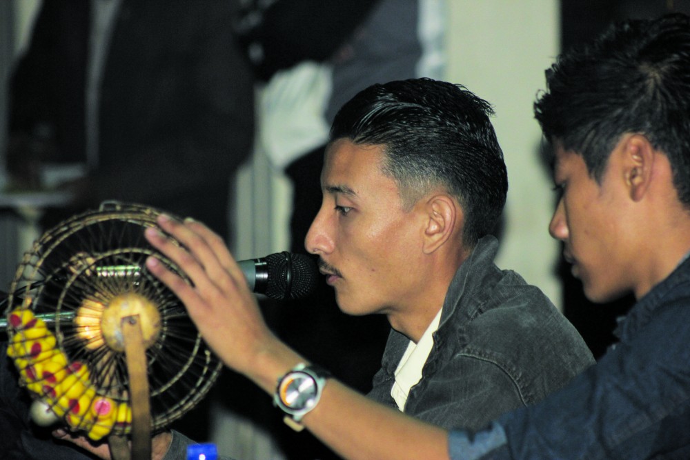 Tongpang Jamir hosting a Tambola game at the Christmas Carnival at Naga Shopping Arcade from December 19-23 (Morung Photo)