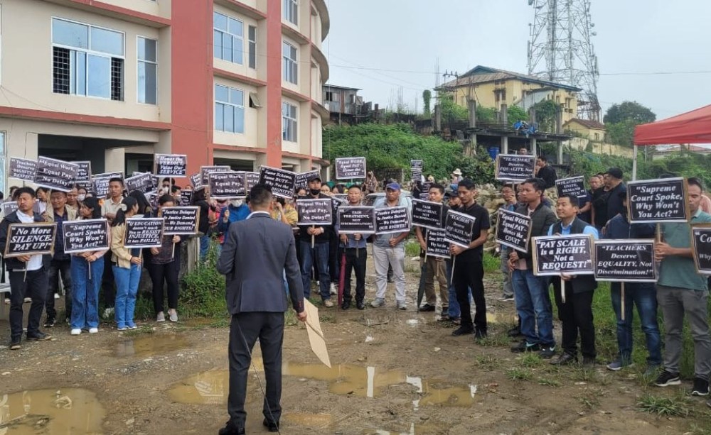 A section of Nagaland RMSA 2016 teachers gather outside the Directorate of School Education, Kohima with placards during the commencement of their indefinite sit-in protest outside on September 8. (Morung Photo)