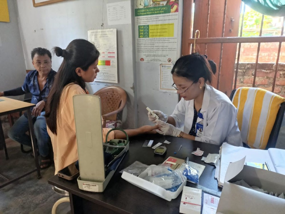 A health worker conducts a screening under the SNSPA campaign at a health unit in Dimapur district.