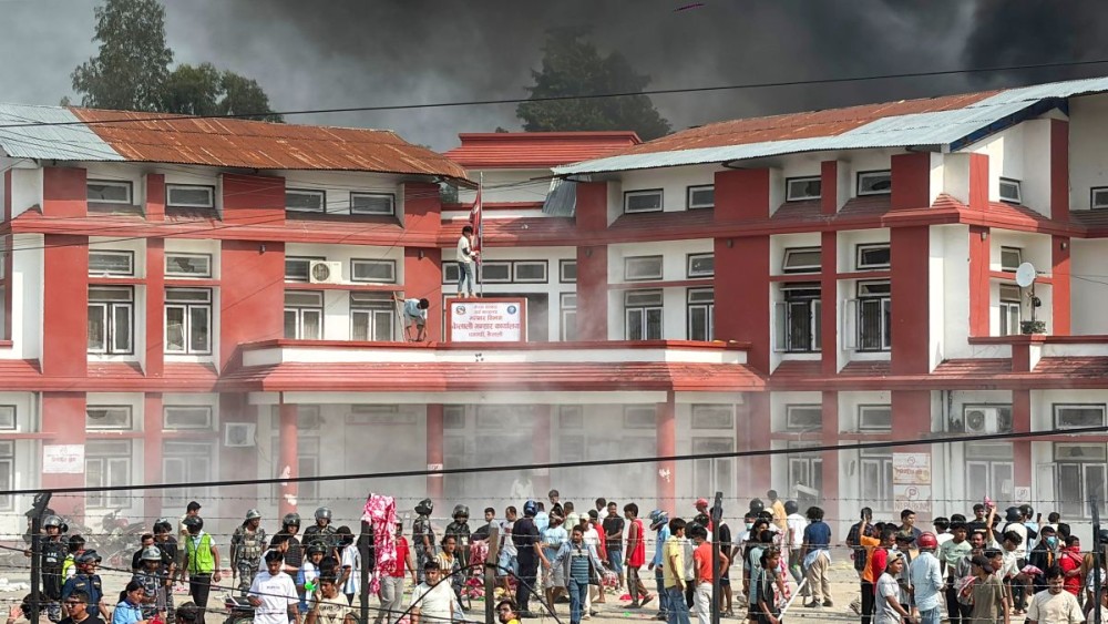 Protesters set fire to the Customs Office amid demonstrations against the government, in Dhangadhi, Kailali district of Nepal, Tuesday, September 9, 2025. (IANS)