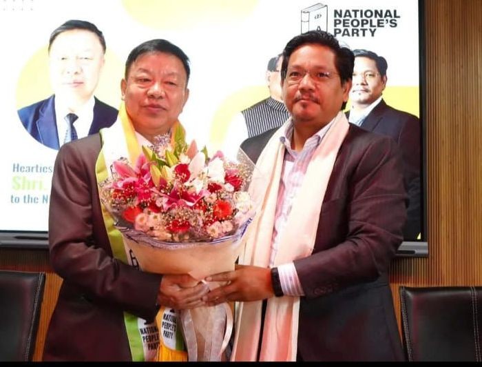 Dr Lorho S. Pfoze with Conrad K. Sangma after joining NPP on September 16 in Shillong.
