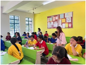 Students participating in the essay writing competition commemorating 90 years of radio broadcasting.