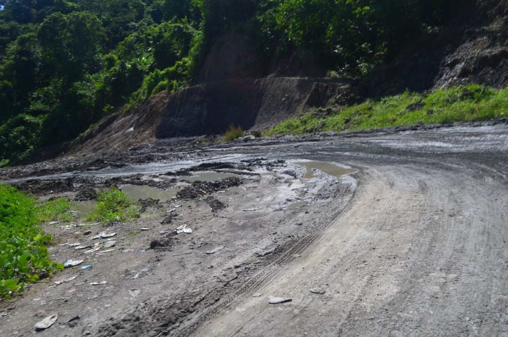 Critical highway routes in Nagaland, including the vital Dimapur-to-Mokokchung road via Kohima and Wokha, have become dangerously dilapidated, posing severe risks to travelers. Beginning in the Chümoukedima area, the route is hazardous with rock falls and stagnant water lining the roads. The situation continues towards Wokha, where mudslides are frequent. Uprooted trees and damaged plantations further increase risks for travelers. The situation is particularly critical on the stretch between the Doyang area and VK Town. In several locations, water flows like a river across the road, creating dangerous conditions for vehicles. The persistent poor infrastructure severely impedes daily commute, economic activity and raises serious safety concerns for residents and visitors alike, who depend on these vital lifelines for transportation across the state. (Morung Photo)