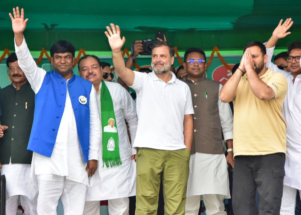 Muzaffarpur: Leader of the Opposition in Lok Sabha and Congress MP Rahul Gandhi, LoP in Bihar Assembly and RJD leader Tejashwi Yadav and Vikassheel Insaan Party chief Mukesh Sahni attend a joint public meeting in support of the party candidate ahead of the Bihar assembly election in Muzaffarpur, Bihar, on Wednesday, October 29, 2025. (Photo: IANS)