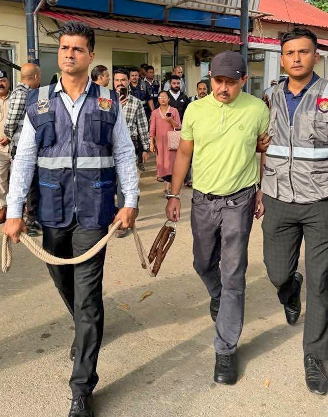 Guwahati: North East India Festival (NEIF) chief organiser Shyamkanu Mahanta, alleged to be involved in the death of legendary singer Zubin Garg in Singapore, is brought to the CID office following his arrest from Delhi, in Guwahti, Assam, Wednesday, Oct. 1, 2025. (IANS)