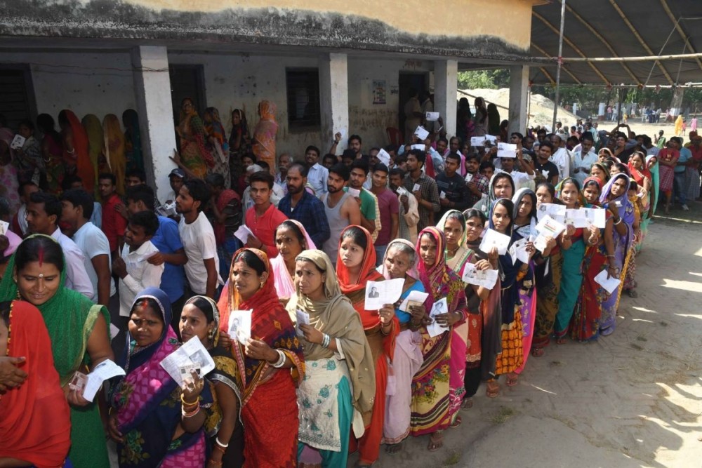Hajipur (Bihar): Voters queue up at a polling station to cast their votes for the fifth phase of 2019 Lok Sabha elections, in Bihar's Hajipur on May 6, 2019. (Photo: IANS)