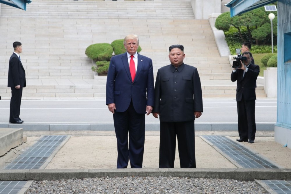 Panmunjom, June 30, 2019  U.S. President Donald Trump meets with Kim Jong Un, top leader of the Democratic People's Republic of Korea (DPRK), in the inter-Korean border village of Panmunjom on June 30, 2019. (Xinhua/NEWSIS/IANS)