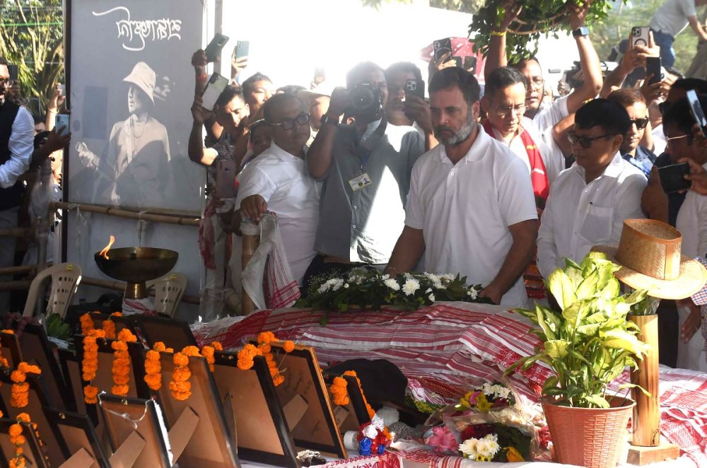 Sonapur: Congress leader and Leader of Opposition Rahul Gandhi pays tribute at the cremation site of the late singer Zubeen Garg in Sonapur, Assam, on Friday, October 17, 2025. (Photo: IANS)