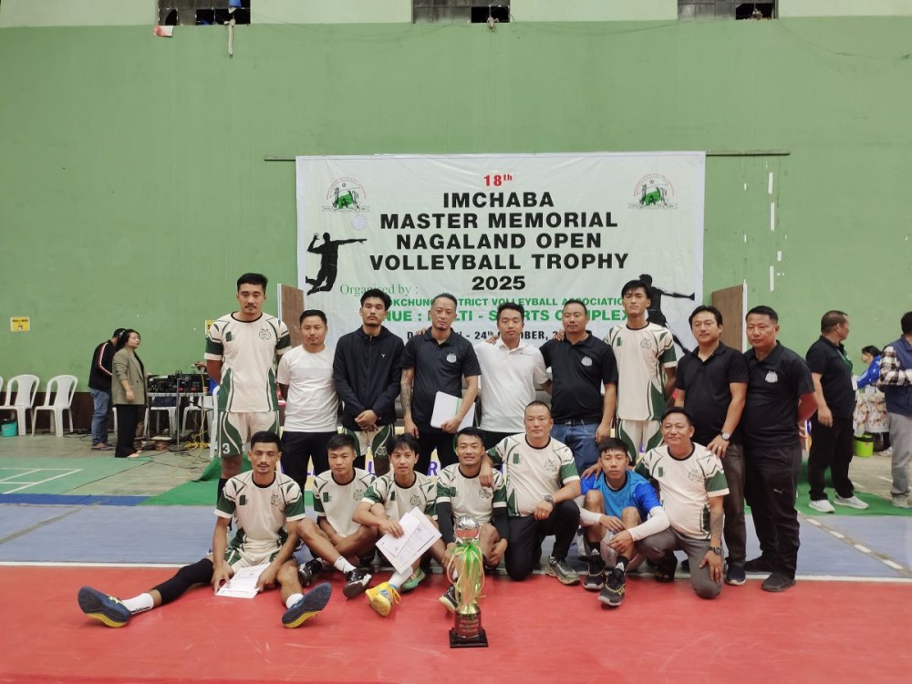 Evergreen Club Ungma players pose with the championship trophy after defeating MH-10 Kohima in the final to win the 18th Imchaba Master Memorial Nagaland Open Volleyball Trophy 2025 at the Multi-Purpose Sports Complex, Mokokchung, on October 24. (Morung Photo)