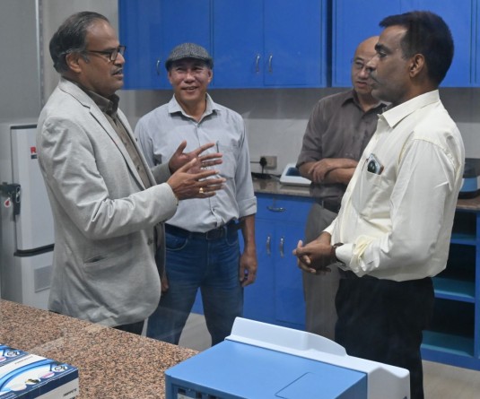 Vice-Chancellor Prof. Jagadish Kumar Patnaik (left) interacts with faculty members during the inspection of the newly inaugurated Cancer Research Laboratory at Nagaland University, Lumami.