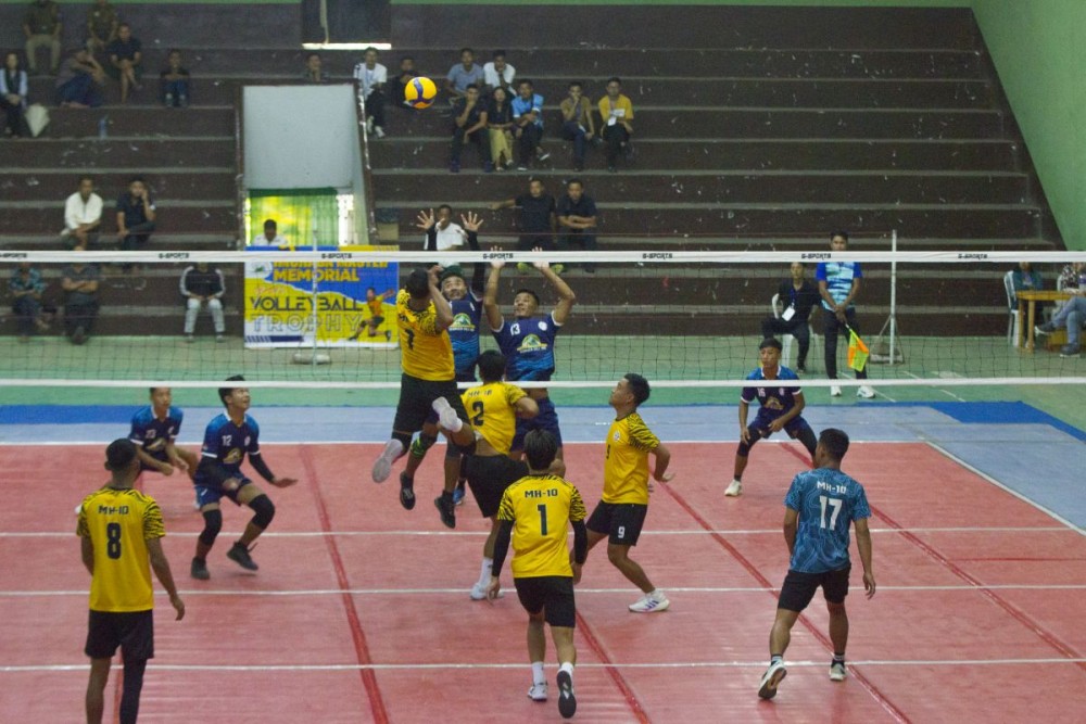 MH-10 (yellow/black) and Chienino Brothers, Kiruphema (blue) in action during the inaugural match of the ongoing 18th Imchaba Master Memorial Nagaland Open Volleyball Trophy 2025 at the Multi-Purpose Sports Complex, Mokokchung, on October 21.