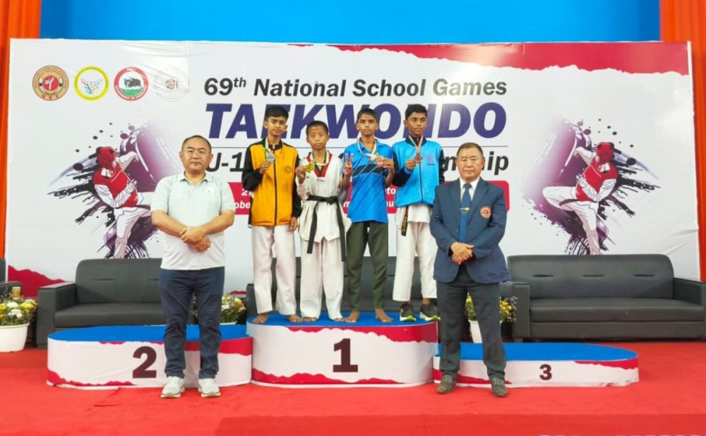 Kethosituo Sekhose Director YRS accompanied by Pele Khezhie President NTA felicitate the medal winners of Under-32 kg of the ongoing 69th National School Games (NSG) 2025 Taekwondo Championship at K Kire Badminton Stadium, Nagaland Police Complex, Chümoukedima on October 29.