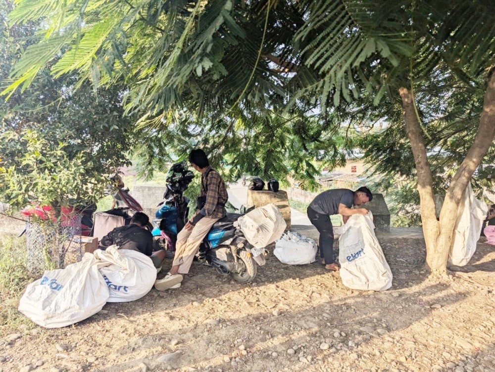 Delivery agents at the NUV Gate, where residents are asked to pick up parcels instead of receiving home delivery.