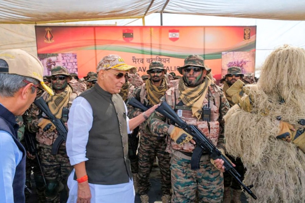 Jaisalmer: Union Minister for Defence Rajnath Singh interacts with soldiers at Laungewala, in Jaisalmer, Rajasthan on Friday, October 24, 2025. (Photo: IANS)