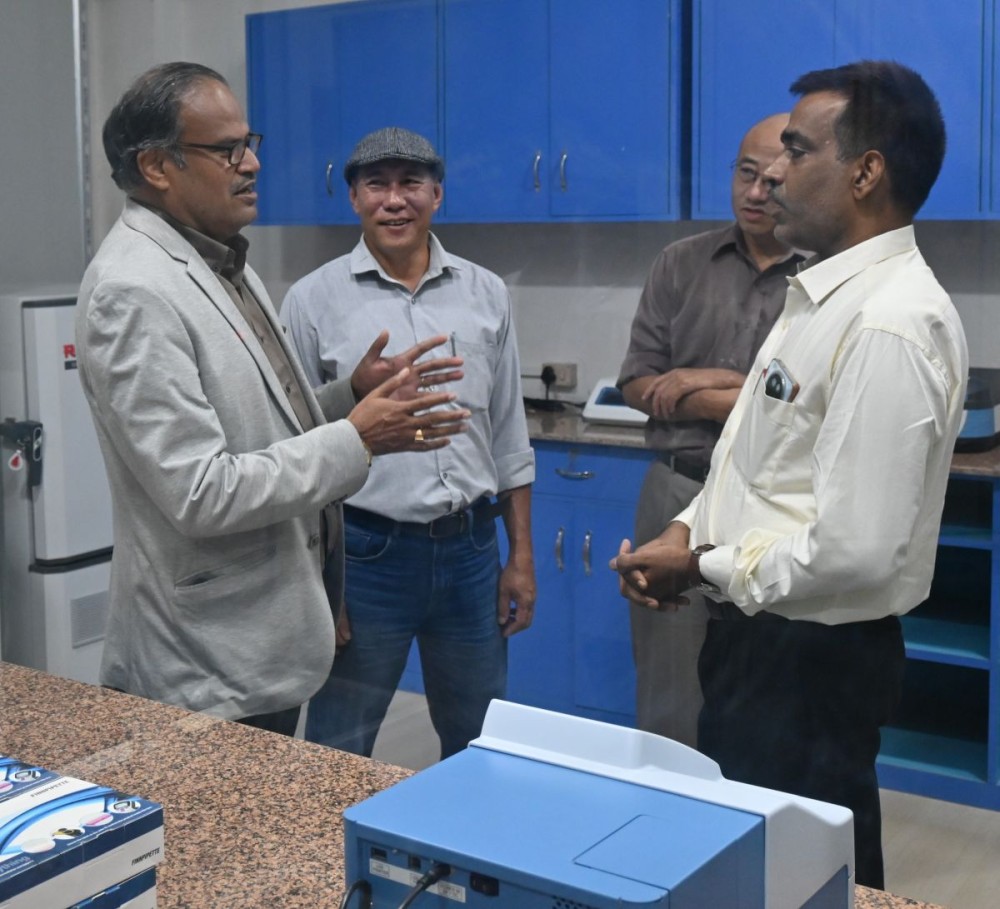 Vice-Chancellor Prof. Jagadish Kumar Patnaik (left) interacts with faculty members during the inspection of the newly inaugurated Cancer Research Laboratory at Nagaland University, Lumami.