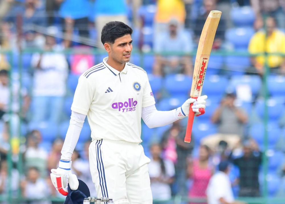 New Delhi: India's captain Shubman Gill celebrates after scoring a century during the second day of the second cricket test match between India and West Indies at the Arun Jaitley Stadium in New Delhi, Saturday, October 11, 2025. (Photo: IANS/Qamar Sibtain)