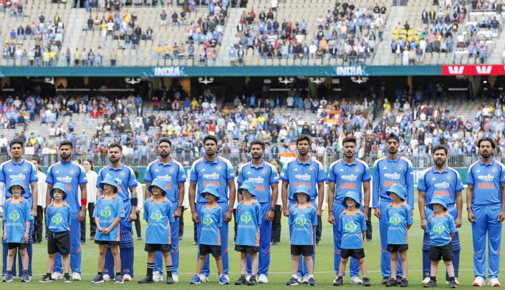 Perth: India’s captain Shubman Gill and teammates stand for the National Anthem before the start of the 1st ODI cricket match between India and Australia at Perth Stadium in Perth, Australia on Sunday, October 19, 2025. (Photo: IANS)