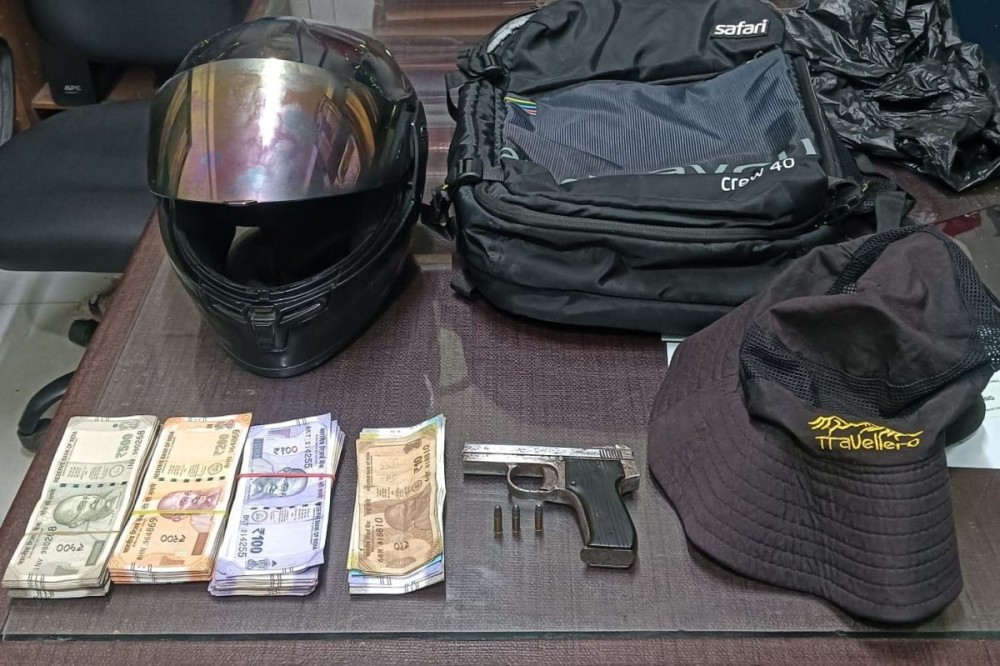 The recovered items along with cash and weapons used in the commission of the attempted robbery.