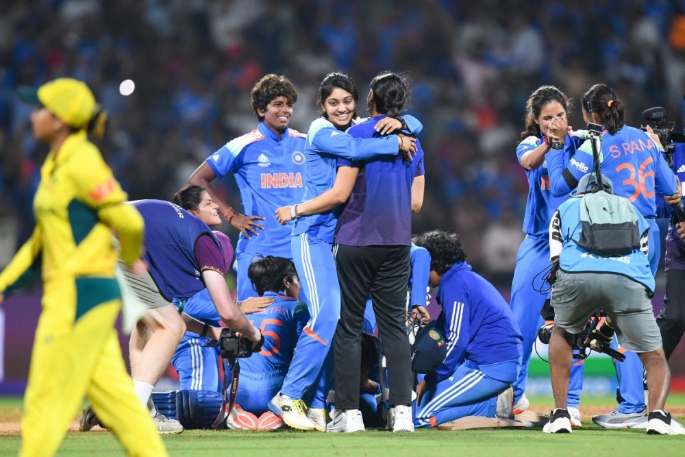 Navi Mumbai: India team celebrate after defeating Australia to qualify for the finals of the ICC Women’s World Cup ODI at DY Patil Stadium in Navi Mumbai on Thursday, October 30, 2025. (Photo: IANS)