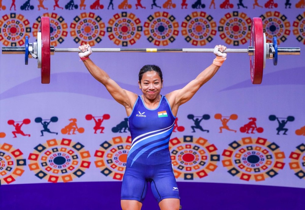Ahmedabad: Tokyo Olympic silver medallist Mirabai Chanu in action as she lifts during the women’s 48kg event, where she won the gold medal on Day-1 of the Commonwealth Weightlifting Championships 2025, in Ahmedabad, Monday, August 25, 2025. (IANS)