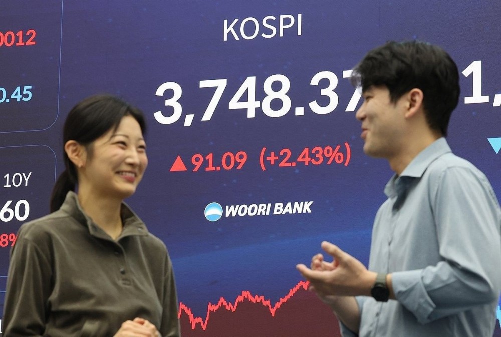 Seoul shares soar to record high on optimism over trade deal with US