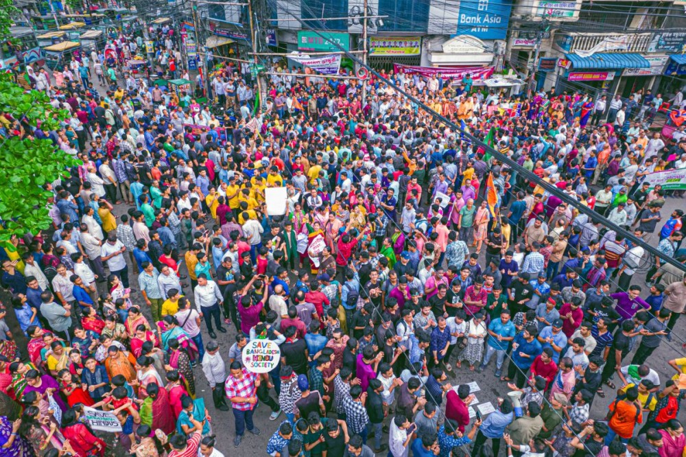 Chattogram: Bangladeshi Hindu community protest against violence targeting the country’s minorities in Chattogram on Monday, August 12, 2024.(IANS)