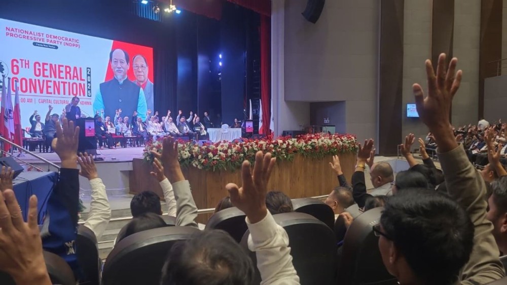NDPP members raise their hands in endorsement of the resolution to merge with the NPF during the 6th General Convention of the NDPP held on October 18 in Kohima. (Morung Photo)