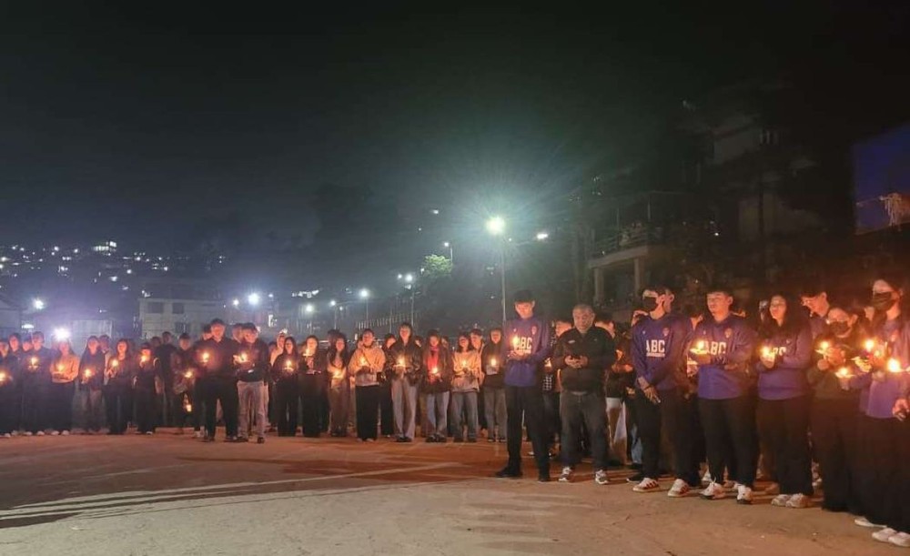 Members of the Kohima District Basketball Association, Team ABC and others hold a candlelight vigil in memory of 22-year-old woman young athlete at D Khel Basketball Court, Seikhazou Kohima on October 29. The woman was found death on October 25 and Kohima Police is currently probing the case. (Morung Photo)