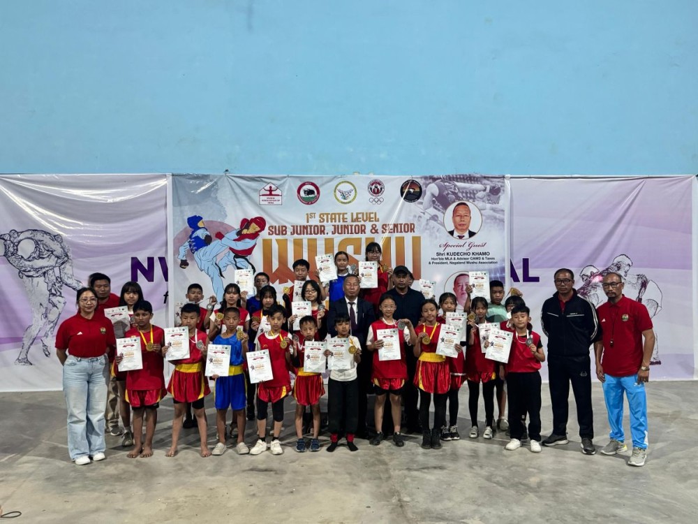 Kudecho Khamo, Libemo Jami, and other NWA officials with the medal winners at Pele Khezhie Indoor Stadium, Kohima on October 29. (Morung Photo)
