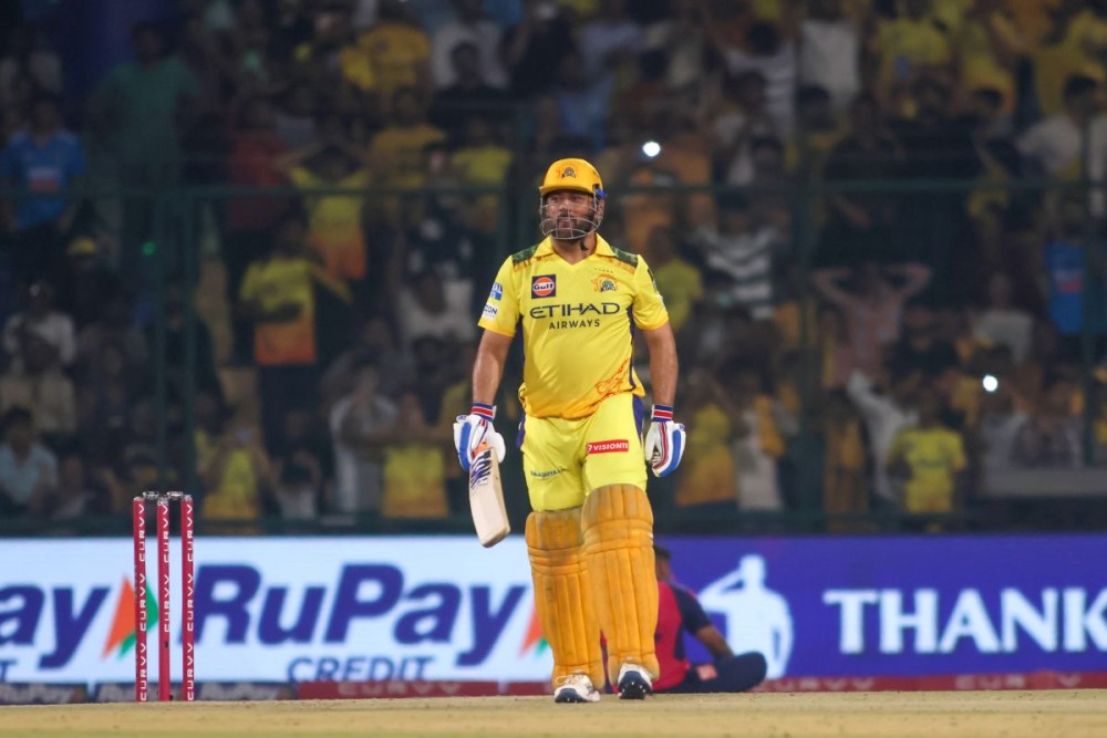 New Delhi: Chennai Super Kings captain MS Dhoni walks off the field after this dismissal during the Indian Premier League (IPL) 2025 match between Chennai Super Kings (CSK) and Rajasthan Royals (RR) at Arun Jaitley Stadium in New Delhi on Tuesday, May 20, 2025. (Photo: IANS/Biplab Banerjee)
