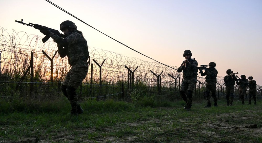 Security personnel keep vigil near the border area in Jammu on Thursday, October 16, 2025. (Photo: IANS)