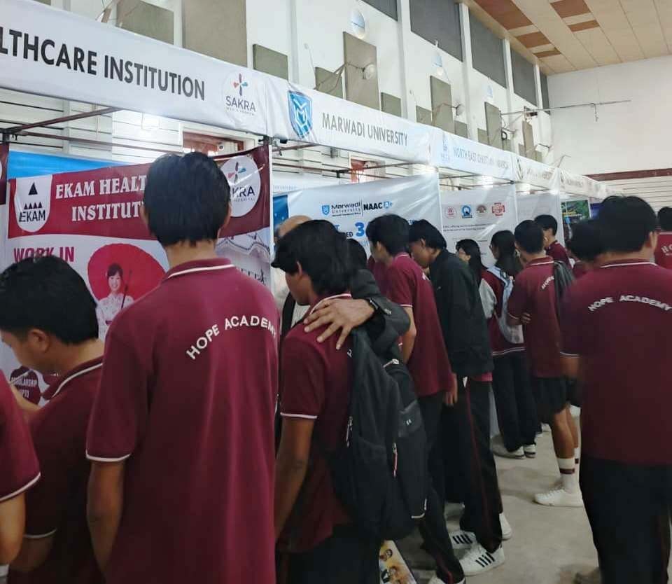 Students engage with the representatives from various colleges and universities present at the Confluence 2.0. (Morung Photo)