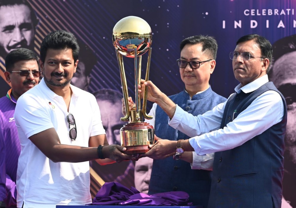 New Delhi: Union Ministers Mansukh L. Mandaviya and Kiren Rijiju and Tamil Nadu Deputy Chief Minister Udhayanidhi Stalin hold the FIH Hockey Men's Junior World Cup Tamil Nadu 2025 trophy during the centenary celebration of Indian hockey, marking 100 glorious years (1925–2025) of the sport’s legacy, at the Major Dhyan Chand National Stadium in New Delhi on Friday, November 7, 2025. (Photo: IANS/Deepak Kumar)
