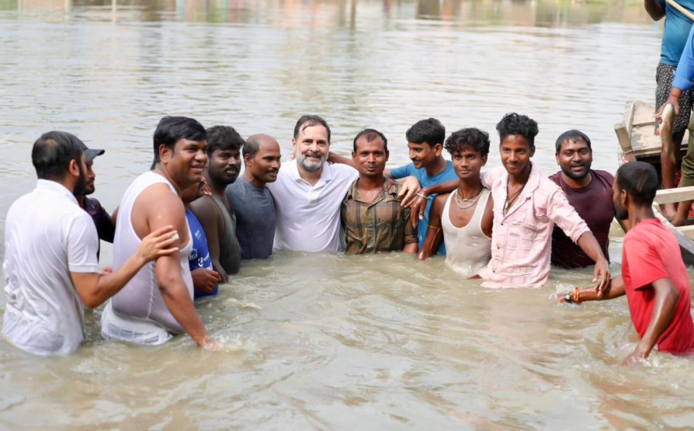 Begusarai: Leader of the Opposition in Lok Sabha and Congress MP Rahul Gandhi joins fishermen in the water during his interaction with the community in Begusarai, Sunday, November 2, 2025. (Photo: IANS)