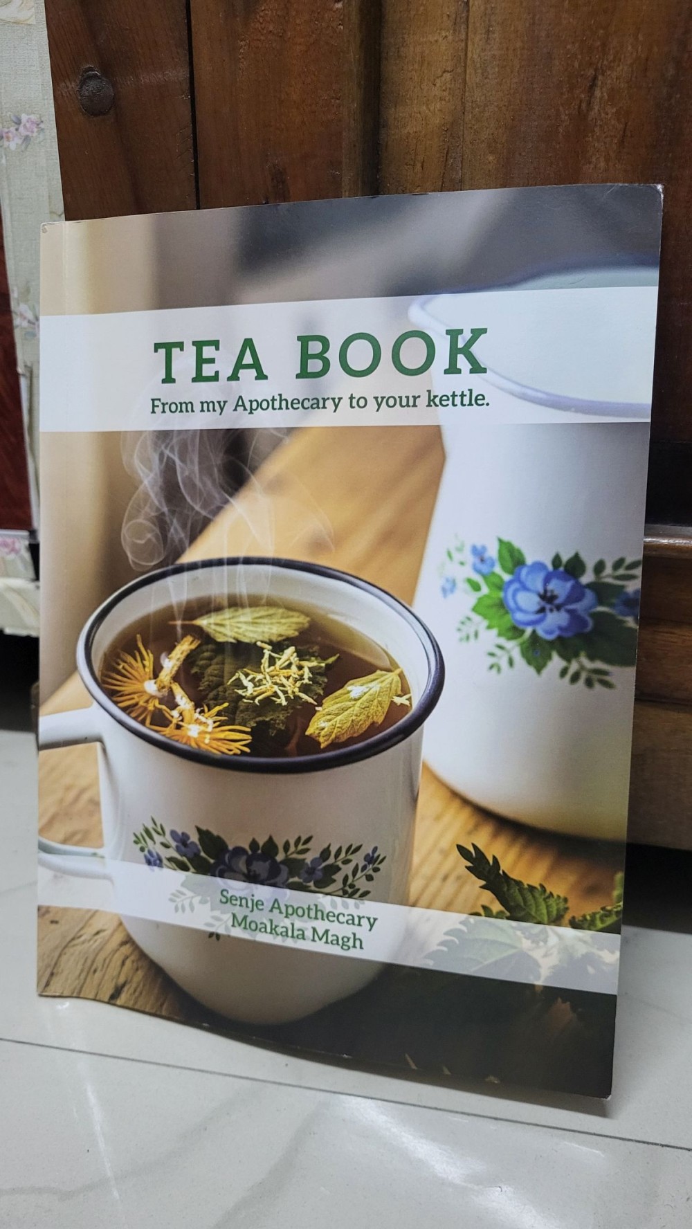 The book ‘Tea Book, from my Apothecary to your kettle’ authored by Moakala Magh.