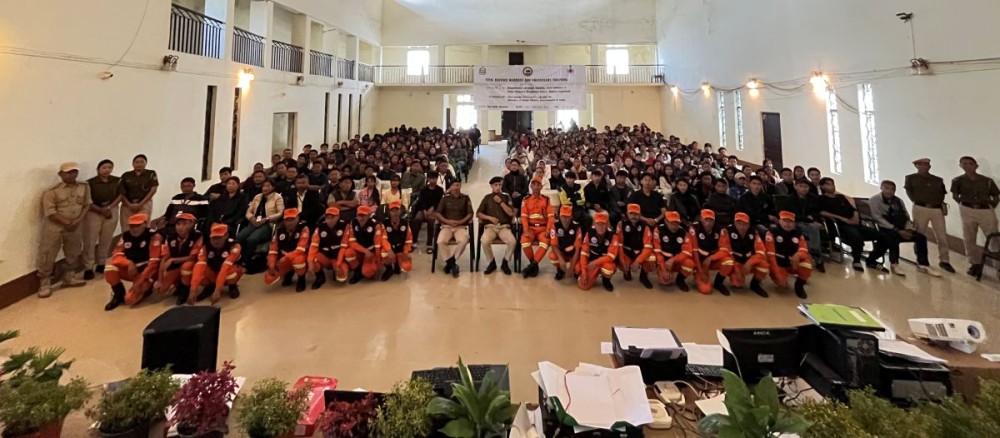 Echung Konyak S handing the certificate to the participants at Tiyi Hall, Wokha on November 24. (Morung Photo)