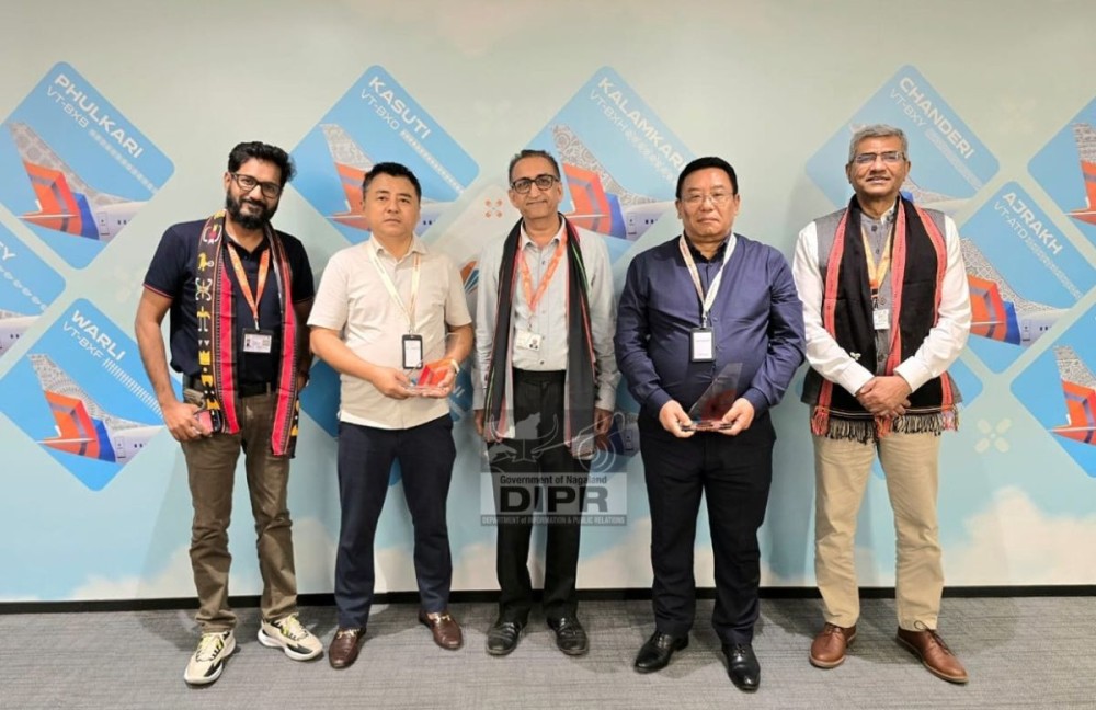 Commissioner & Secretary, Transport, Robert Longchari and M. Ababe Ezung, OSD Transport with Alok Singh, Managing Director, and Shashi Chetia, Vice President at Air India Express office. (DIPR Photo)