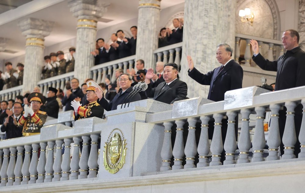 North Korean leader Kim Jong-un observes a military parade held at Kim Il Sung Square in Pyongyang on Oct. 10, 2025, to mark the 80th anniversary of the founding of the country's ruling Workers' Party of Korea, in this photo released by the North's official Korean Central News Agency the next day. (IANS File Photo)