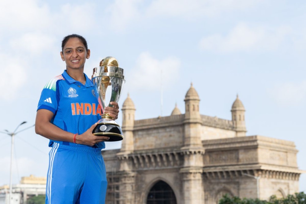 India Women’s captain Harmanpreet Kaur poses with the ICC Women’s Cricket World Cup Trophy after leading the team to their maiden title. (IANS/BCCIWomen)