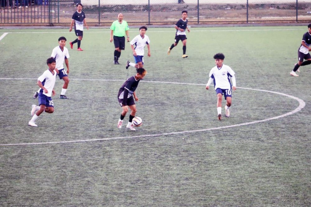 A match in between Tujunu United FC (black jersey) vs GHSS Hakushang FC on Monday at Loyem Memorial Astro Turf. (Morung Photo)