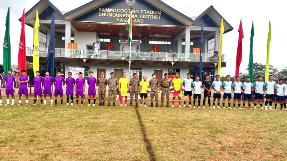 Players with officials during the Hornbill Football Tournament 2025 at the Sammogooting Football Stadium.