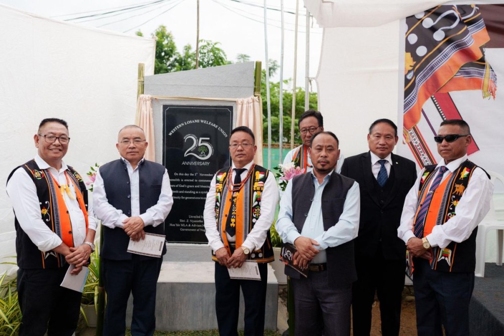 Nyusietho Nyuthe with others after unveiling golden jubilee monolith.