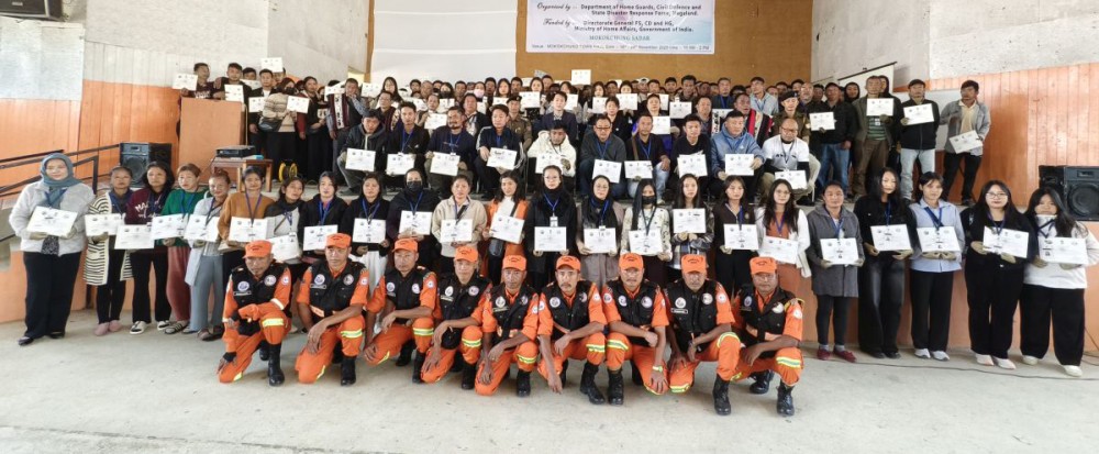Officials and trainees of the Civil Defence Wardens & Volunteers Training pose for a group photo after the closing programme at Town Hall, Mokokchung, on November 24, displaying their certificates of completion. (Morung Photo)