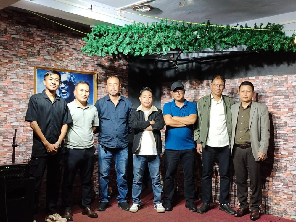 Members of the folk-fusion band ‘Sariwar’ and others during the premiere of its debut eponymous music video single at Aroma Café, Mokokchung, on October 31. (Morung Photo)